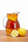 Ice tea with lemon pitcher