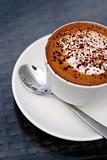Delicious cappuccino in a white cup.