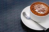 Delicious cappuccino in a white cup.