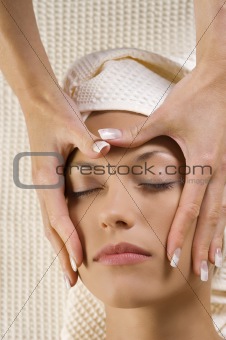 hands massage on face