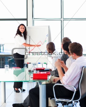 Confident businesswoman smiling in a presentation