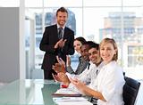 Businessteam clapping at the end of a presentation