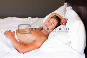 Attractive young man sleeping
