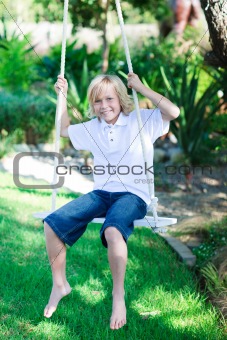 Child playing with a swing