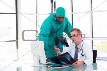 Doctors looking at an X-ray