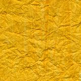 crumpled yellow painted paper texture