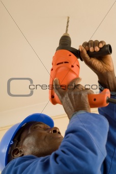 Construction Worker Working with Power Tool