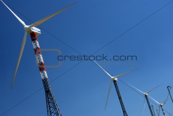 Windmills in blue sky