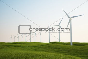wind turbines on green grass field