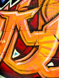 Orange graffiti on wall