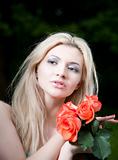 Beauty Blonde Woman With Roses