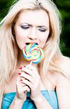 Woman Eating Lollipop