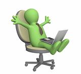 3d puppet, sitting with a laptop