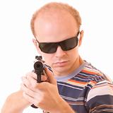 Young man with gun isolated