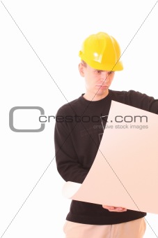 Young man with paper in yellow helmet isolated on white