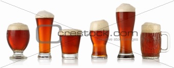 Different glasses of cold beer