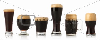 Differentglasses of stout beer