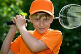 Cute boy with badminton racket