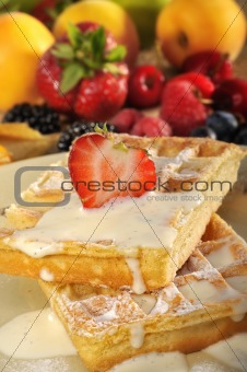 Waffles with vanilla cream and fruits