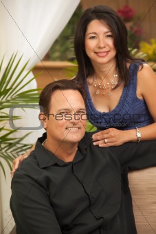 Happy Attractive Hispanic and Caucasian Couple Portrait.