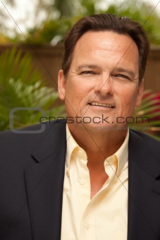 Handsome Male Portrait with Sportcoat in the Outdoors.