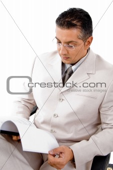 top view of businessman looking in to file