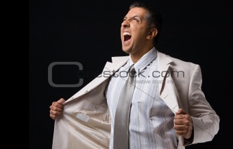 side view of shouting boss holding his coat