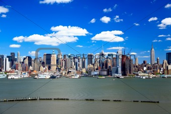 The Mid-town Manhattan Skyline on a sunny day