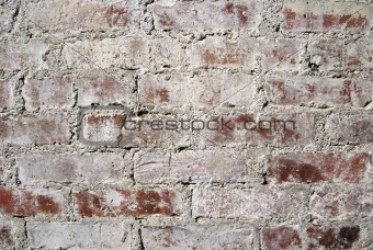 Very old red brick wall in Cairo. Textured background.