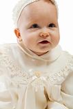 Baby in baptismal dress
