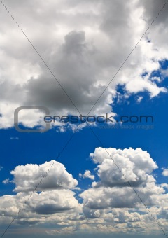 White clouds over blue sky