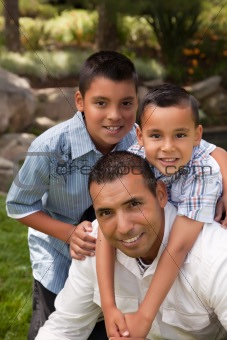 Father and Sons Portrait in the Park.