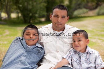 Father and Sons Portrait in the Park.
