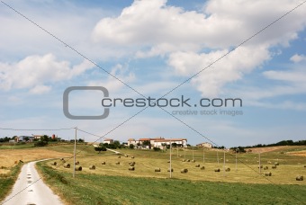 Country road and hay bales