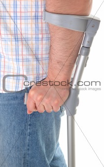 man walking with a crutch