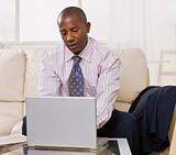 African American male with laptop