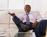 Attractive African American Man watching TV