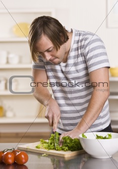 Attractive male cutting lettuce