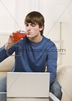 Attractive male drinking