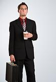 Attractive man with coffee and briefcase