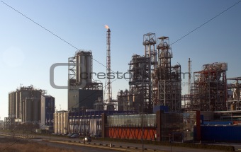 Oil refinery before sunset