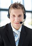 Young businessman with a headset on