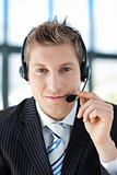 Handsome oung businessman with a headset on