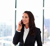 Attractive businesswoman talking on phone