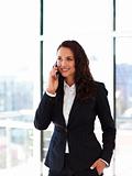 Smiling businesswoman talking on phone