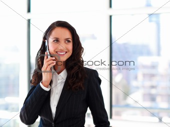 Smiling businesswoman talking on phone