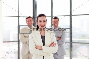 Attractive businesswoman with folded arms