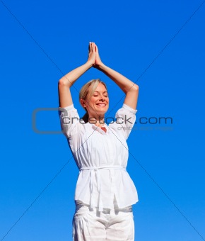 Young woman doing yoga 