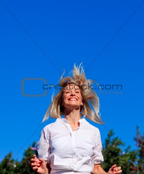 Young woman jumping in a park
