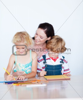 Mother painting with her children 